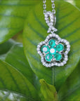 White gold emerald cluster necklace