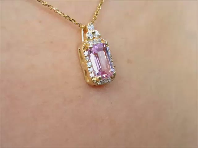 Natural pink sapphire pendant necklace and diamonds made in 14k yellow gold.