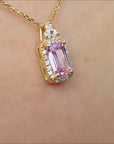 Natural pink sapphire pendant necklace and diamonds made in 14k yellow gold.