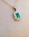 Natural Muzo colombian emerald GIA certified in a 18k yellow gold pendant.