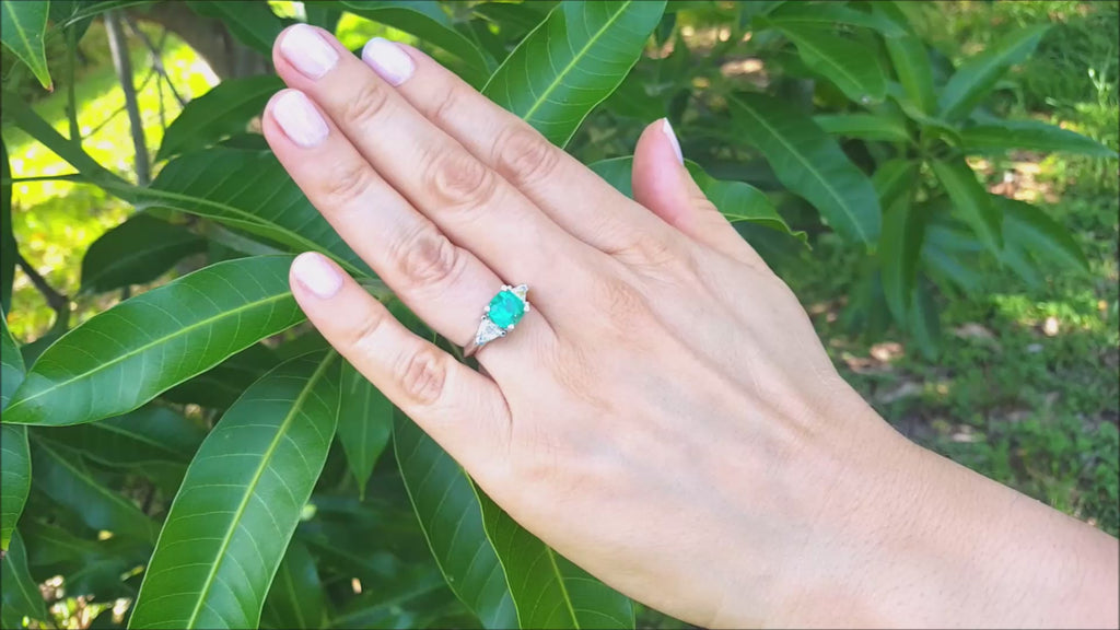 Cushion cut emerald and trillion diamond rings for women