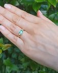 Solitaire bezel set emerald ring 14k yellow gold