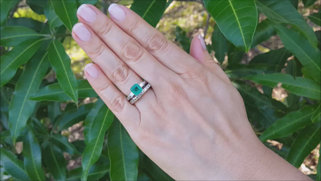 Emerald ring and diamond wedding band set