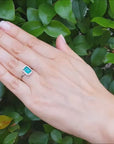 Emerald-cut Colombian emerald and diamond ring