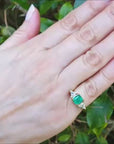 Square emerald and trillion cut diamonds ring for ladies in 18k yellow gold.