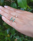 Baguette diamond and emerald stud earrings