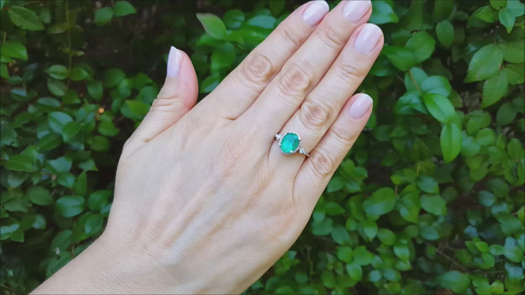 Oval cut women's natural emerald ring