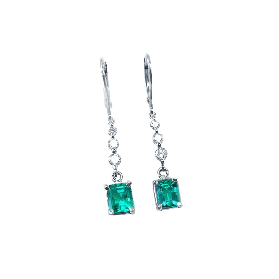 14K white gold dangle earrings with square Colombian emeralds and diamond accents.