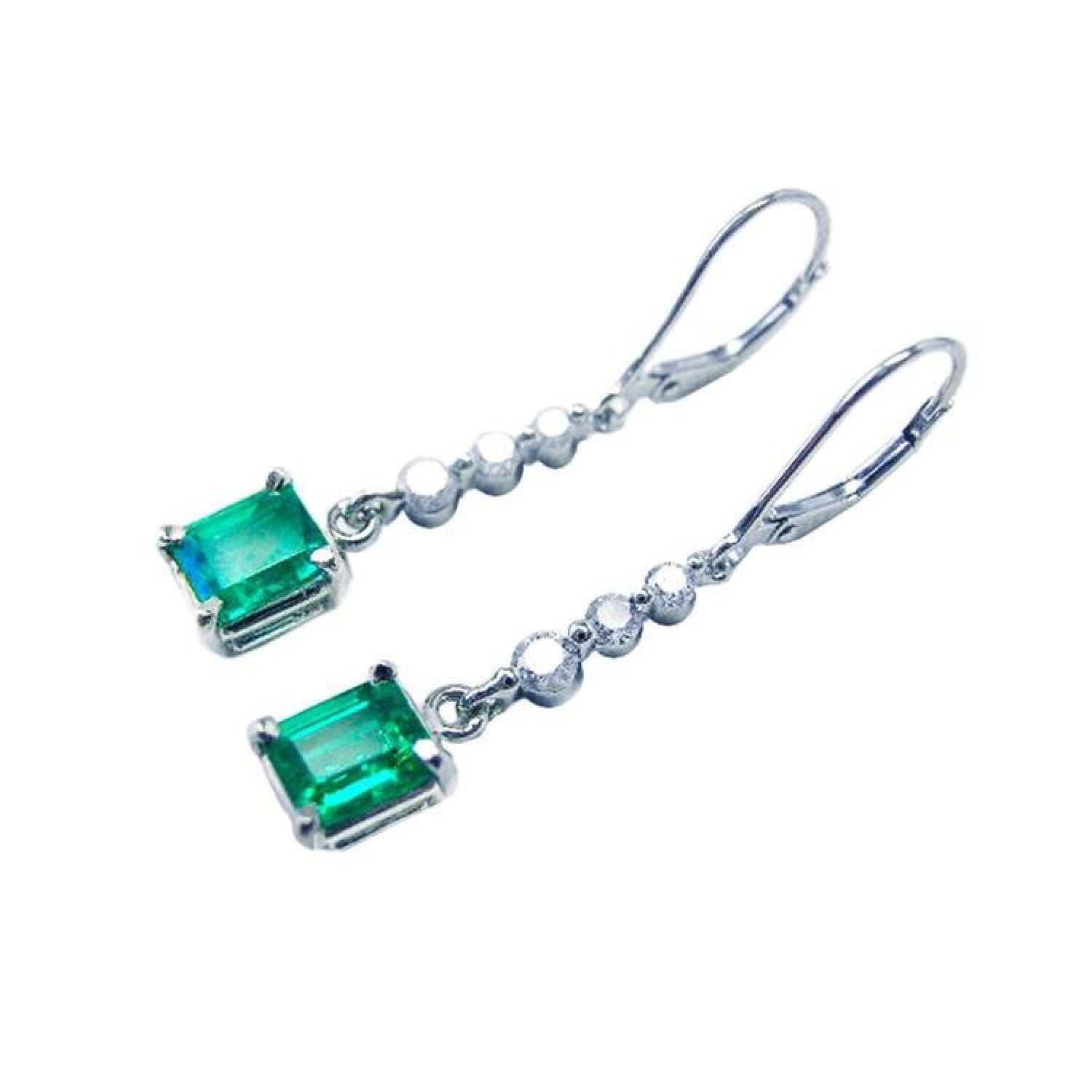 1.55 ct. Colombian emerald dangle earrings with 14K white gold lever backs.