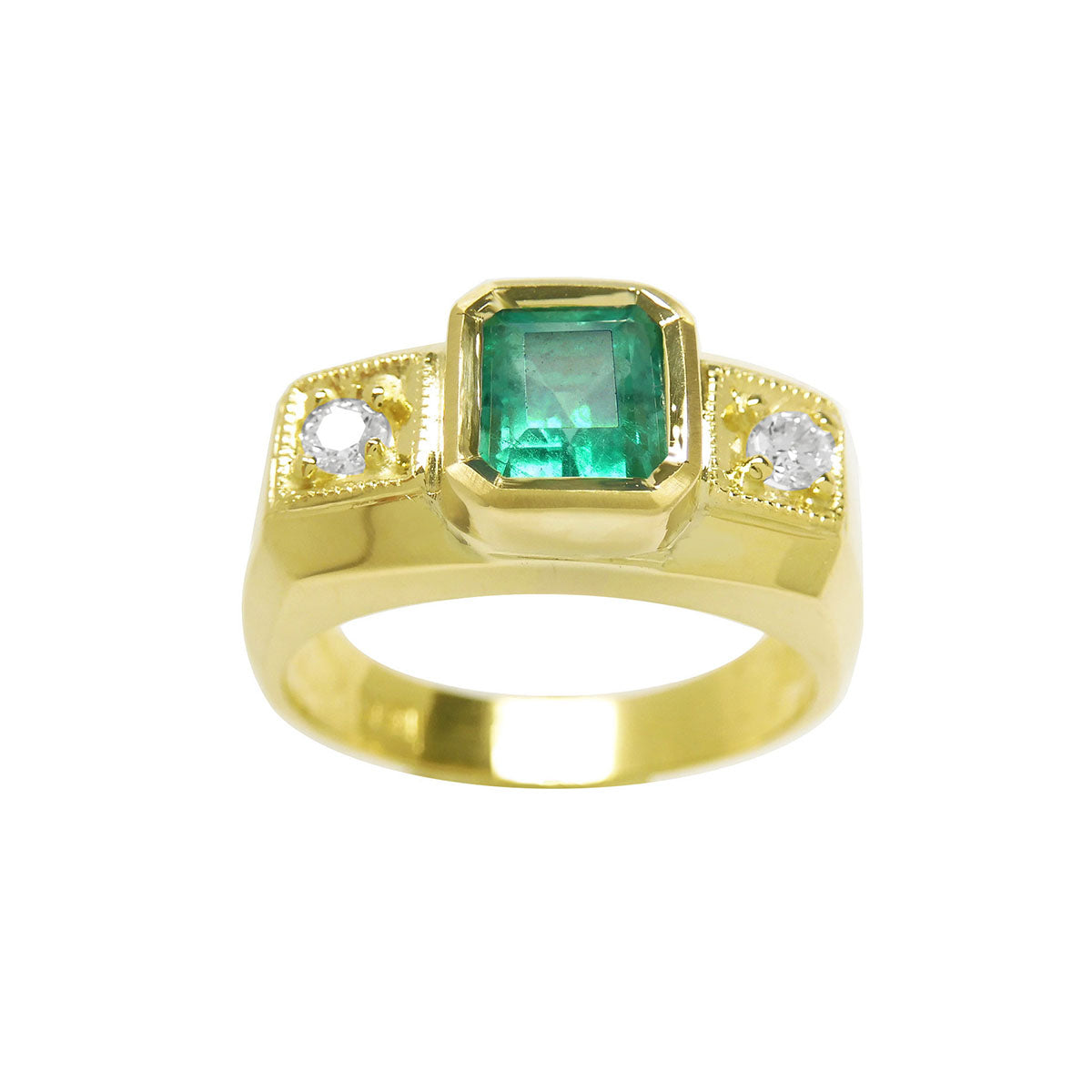 Gold ring with a natural colombian emerald and two diamonds on a white background