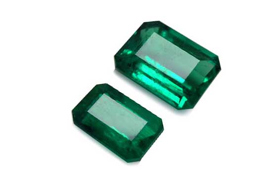 Real Colombian emeralds displaying its top side were tables and crowns are visibles explaining high quality cut  