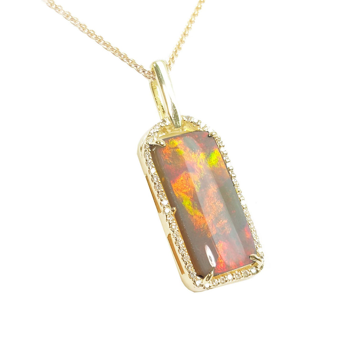 A natural Australian opal pendant necklace with gold chain on a right-side profile view.