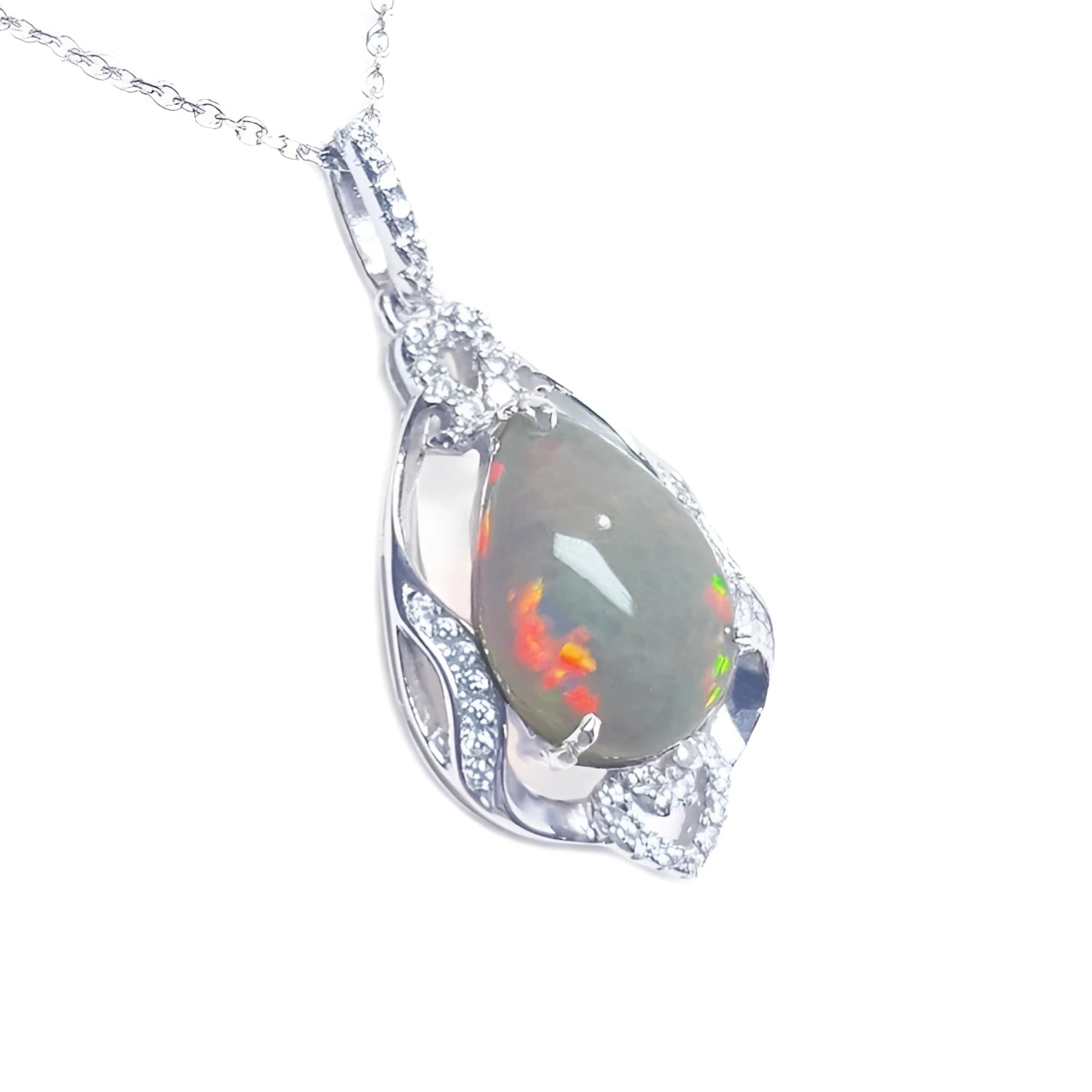 Pear-shaped Welo Ethiopian opal pendant in sterling silver with cubic zirconia accents.