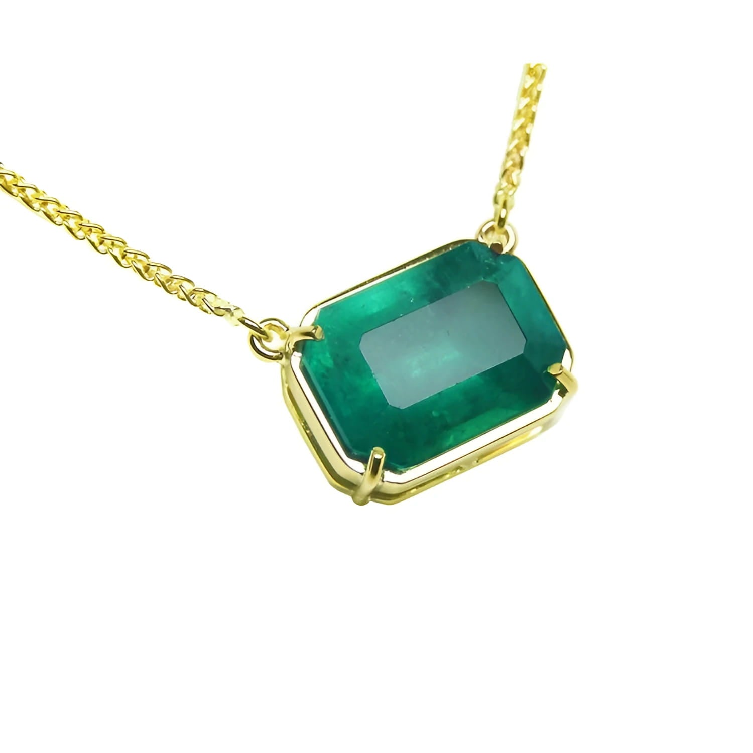 Emerald solitaire necklace 5.52 carats emerald-cut from the Muzo mine, set in a handcrafted 18k yellow gold frame