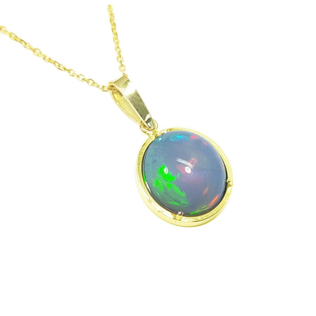 Ethiopian Welo opal pendant with gold frame on a right-side profile.