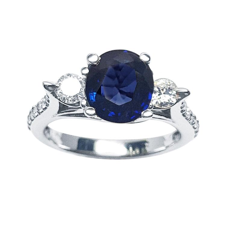 Women's natural blue sapphire ring side diamonds three stone white gold, front view full top 