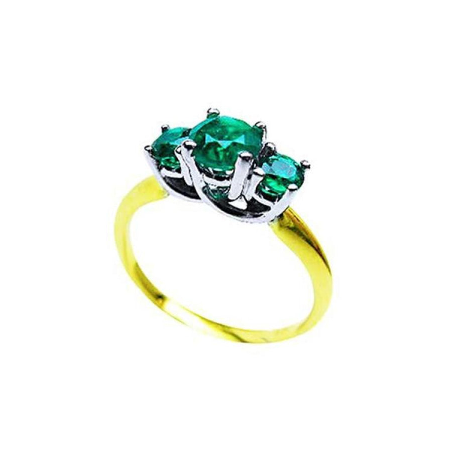 Round cut three-stone emerald ring, 0.62 cttw, with prong-set stones in white and yellow gold.
