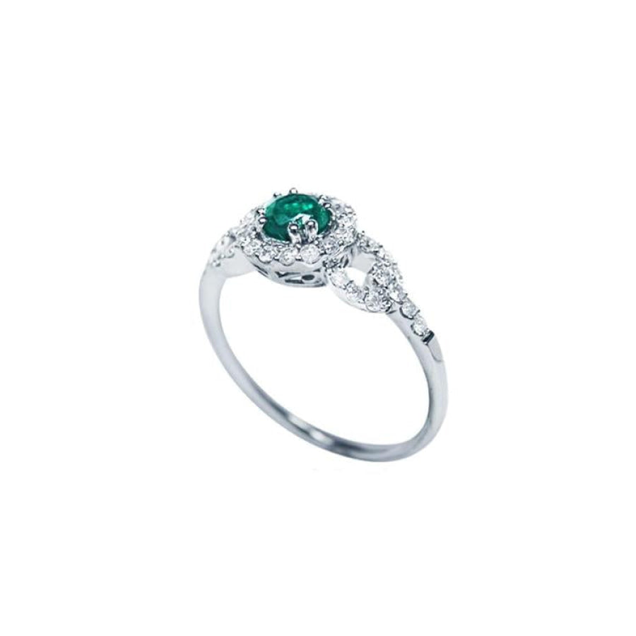 14K white gold ring with a round emerald center stone surrounded by a halo of natural diamonds.