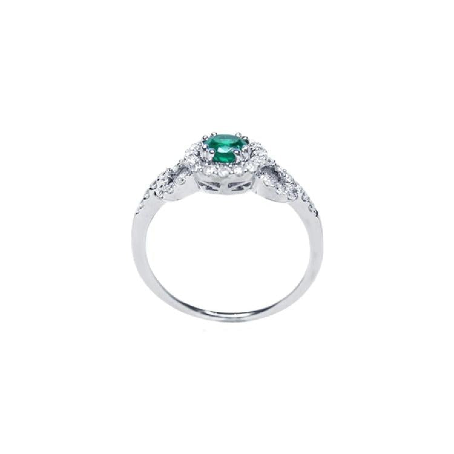 Round cut emerald halo ring with natural diamonds set in 14K white gold.