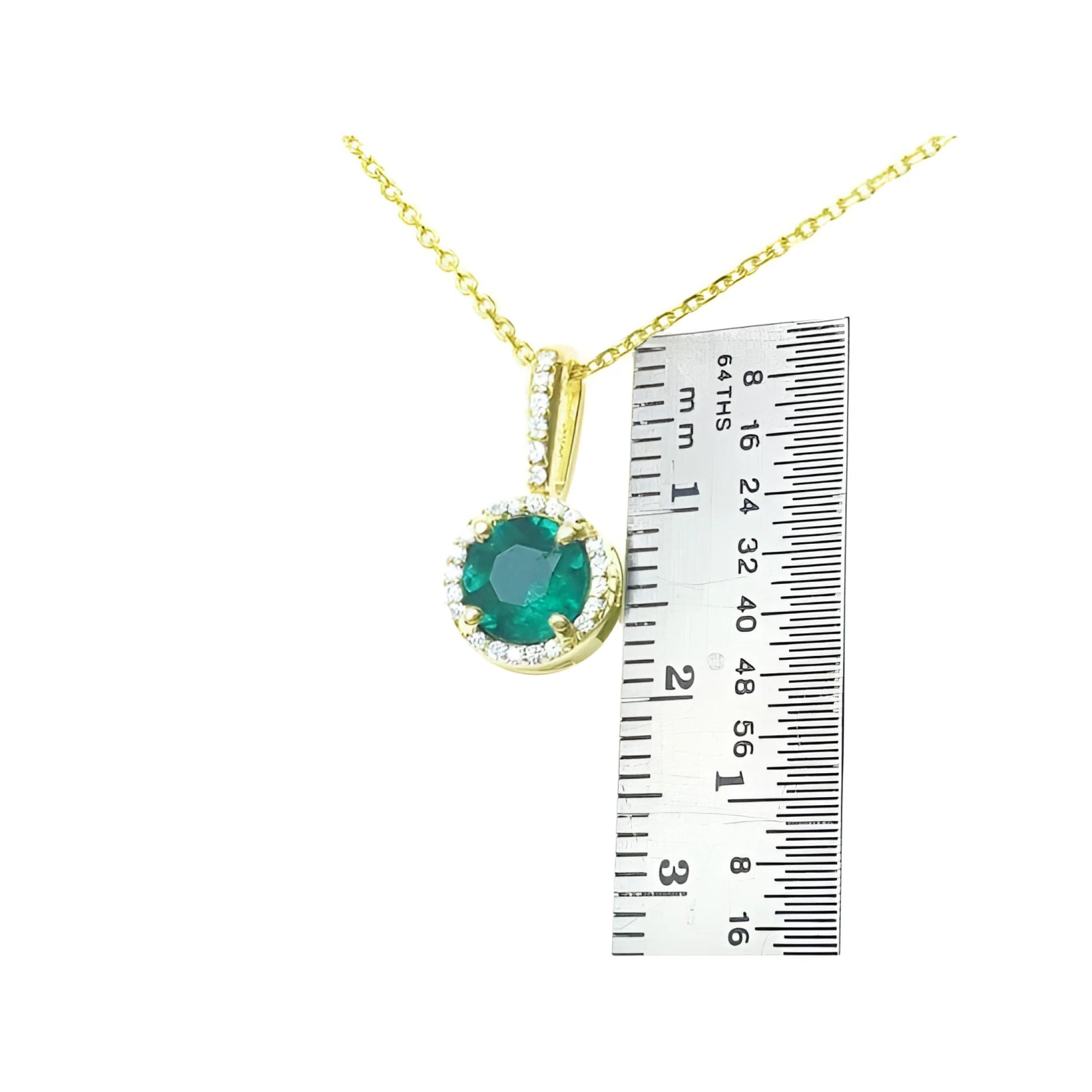 0.88 ct. round Colombian emerald pendant with halo diamonds on a 14K gold chain, next to a ruler.