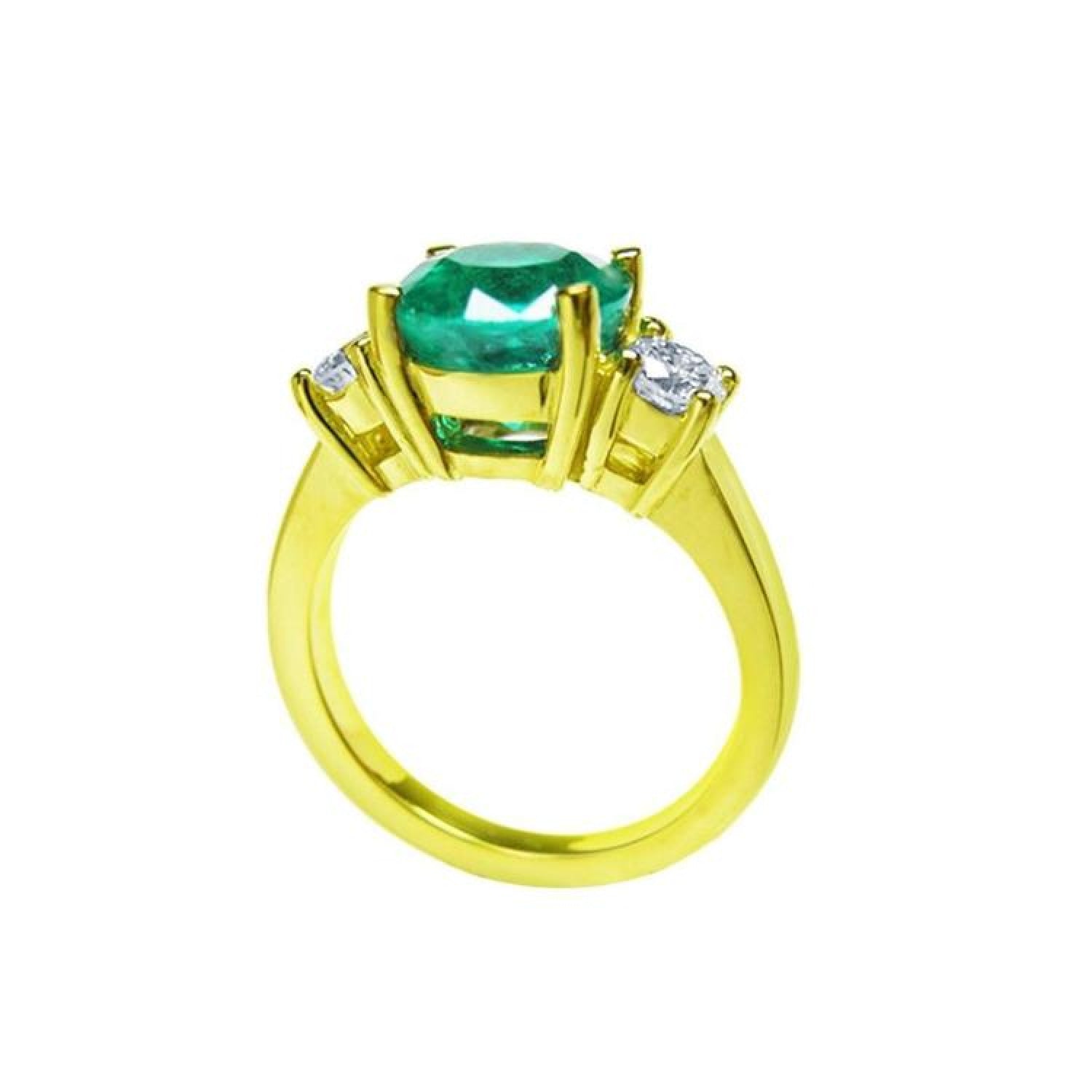 18K yellow gold three-stone ring with a GIA certified F1 Colombian emerald and two round accent diamonds.