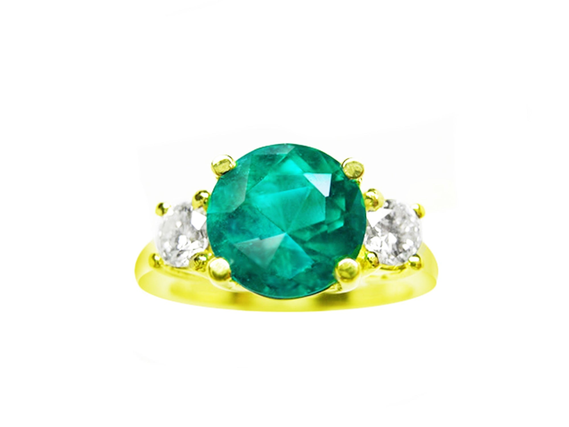 Natural round cut emerald with two side diamonds ring yellow gold, close top view on a top front position