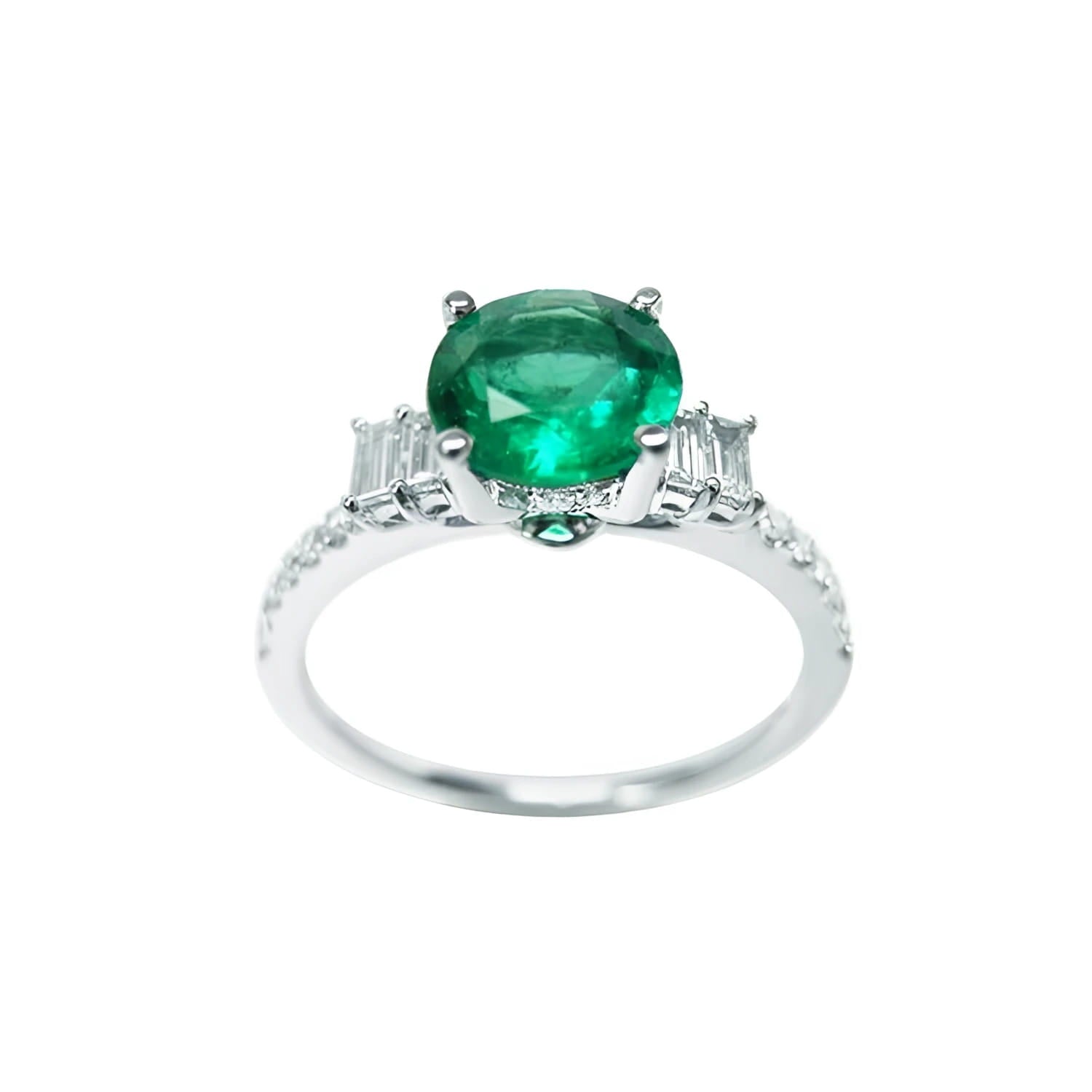 1.10 ct. round Colombian emerald ring with baguette side diamonds on a 14K white gold band.