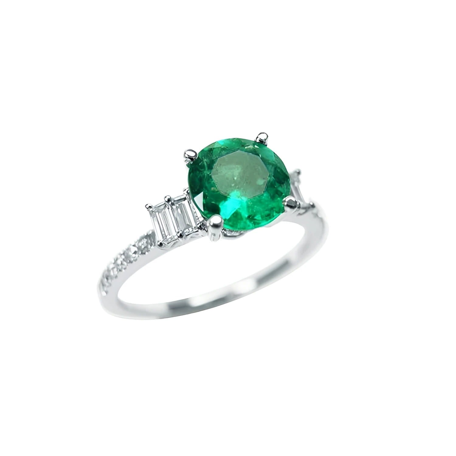 1.10 ct. round Colombian emerald ring with baguette side diamonds in 14K white gold.
