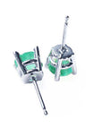 Pair of earrings with round cut colombian emeralds and 14k white gold metalwork on a upside down position.