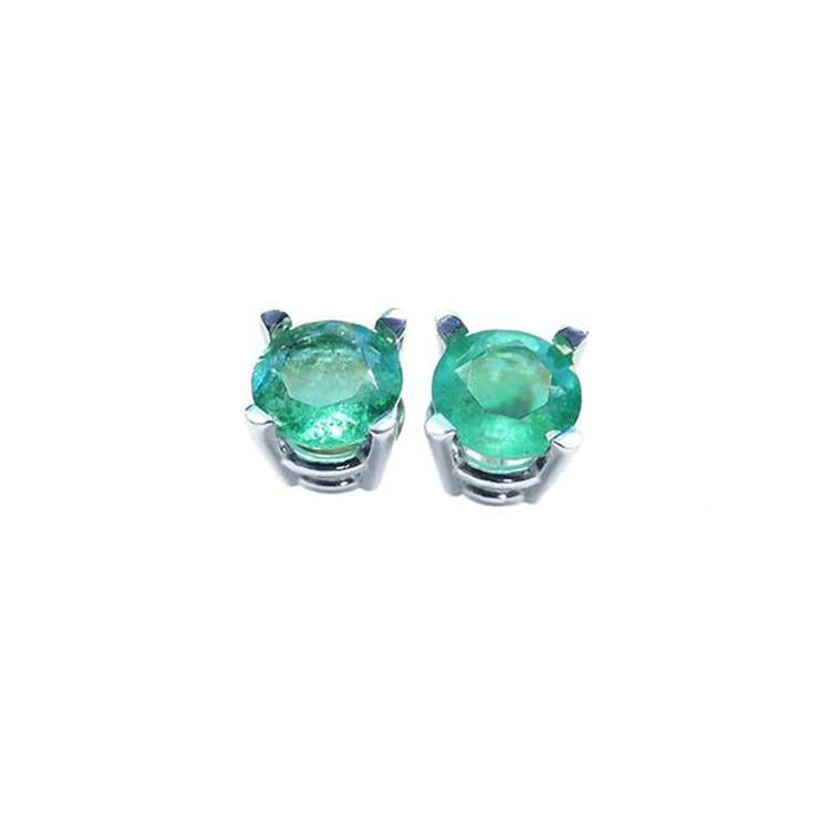 Pair of natural colombian emerald stud earrings made of 14k white gold and push backs.