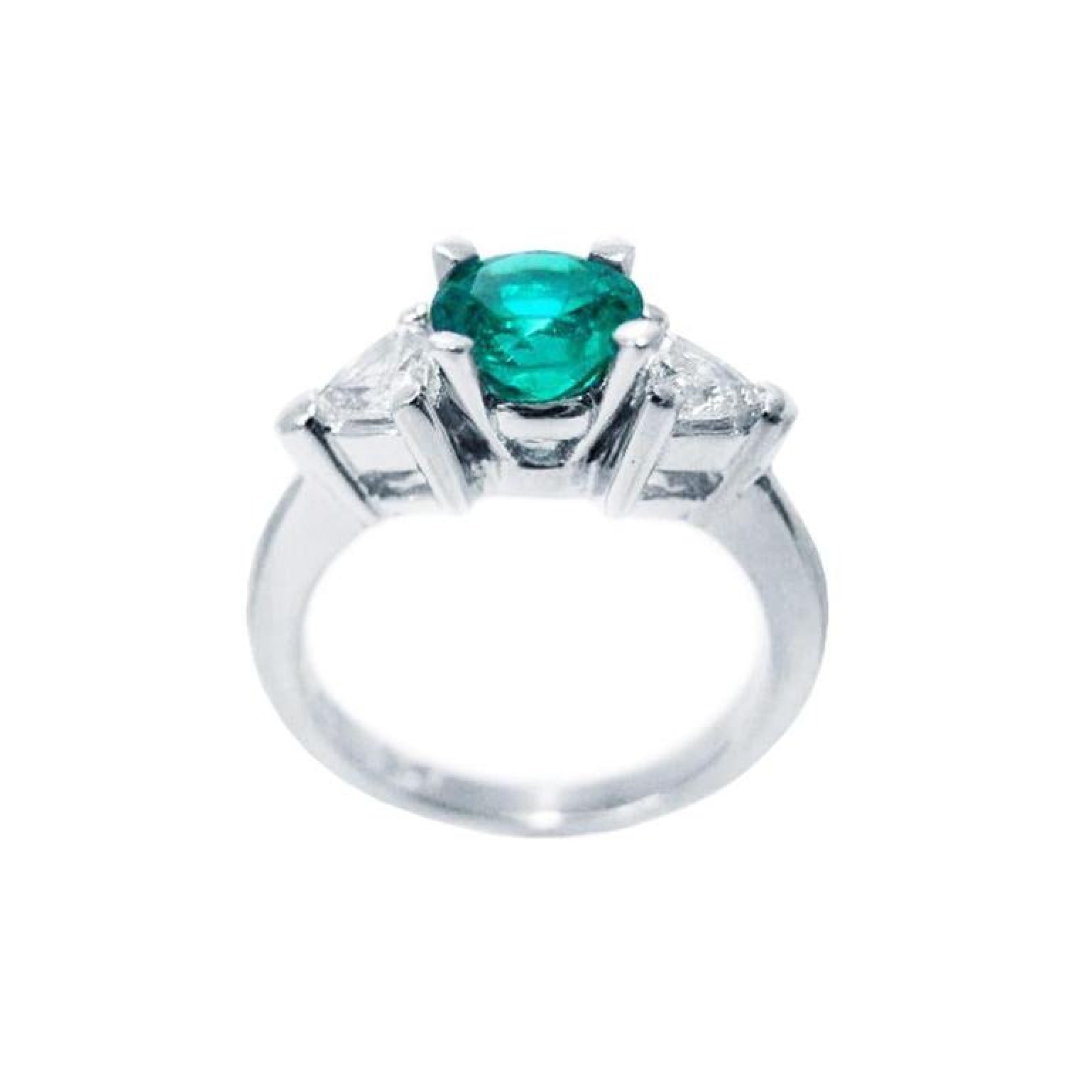 14K white gold ring with a vibrant round emerald center stone and two trillion-cut side diamonds.