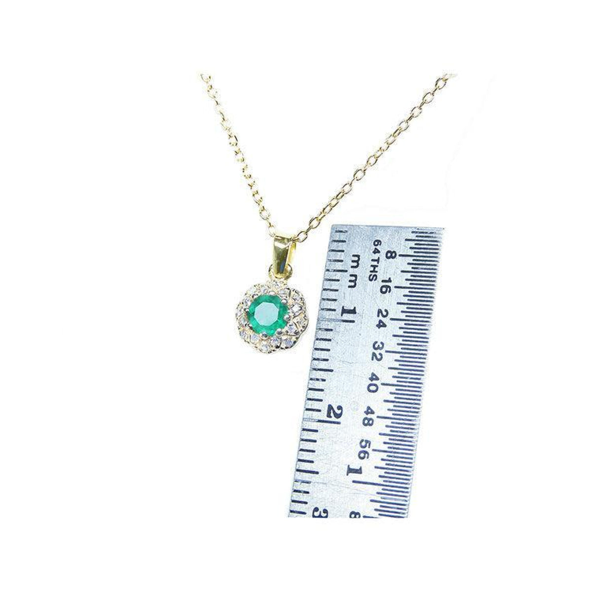14K yellow gold minimalist necklace with a round-cut Colombian emerald and diamond halo, shown with a ruler.