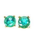 Pair of green gemstone earrings on a white background