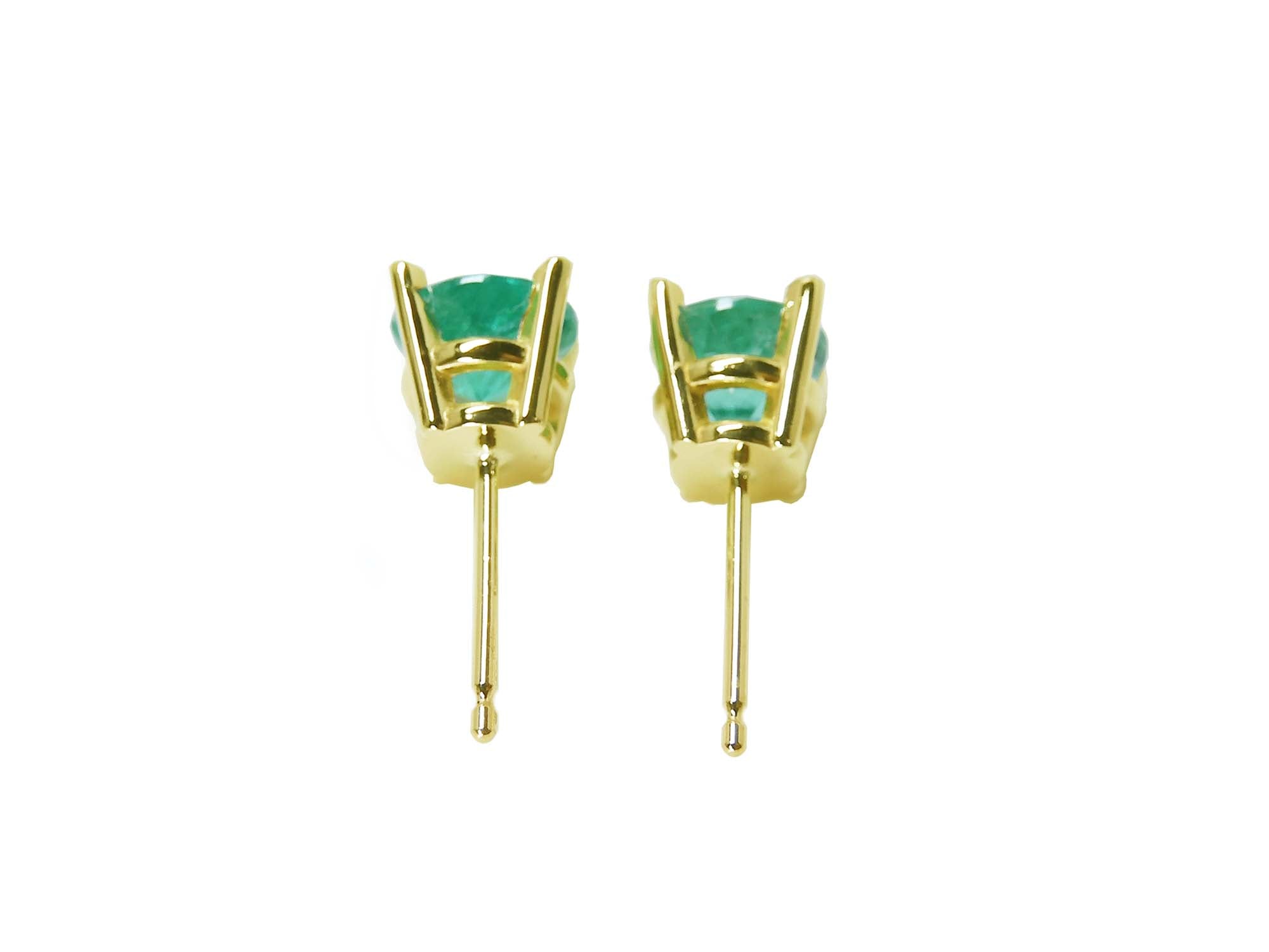 Baket settings 14k yellow gold emerald stud earrings round cut, side profile view.