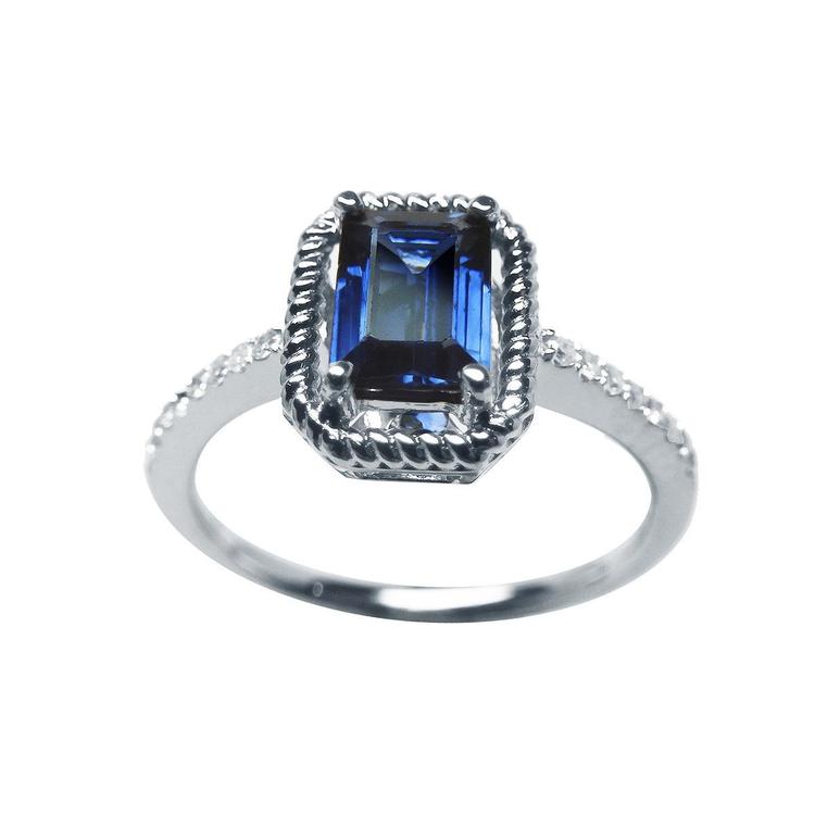 Women's sapphire solitaire ring medium light blue accent diamonds 14K white gold, front position top full view