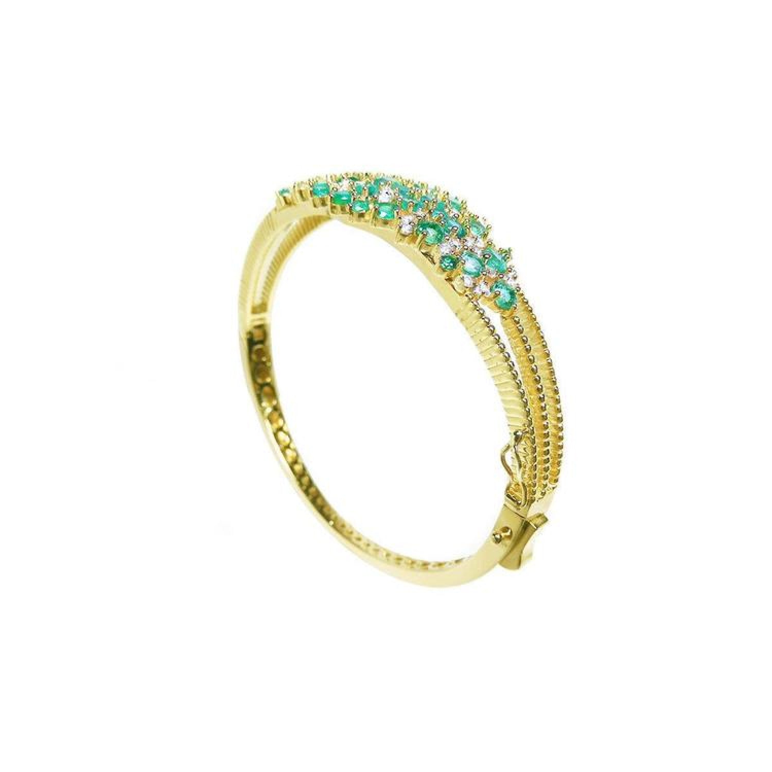 14K yellow gold bangle bracelet with round Colombian emeralds and diamonds in a floral design.
