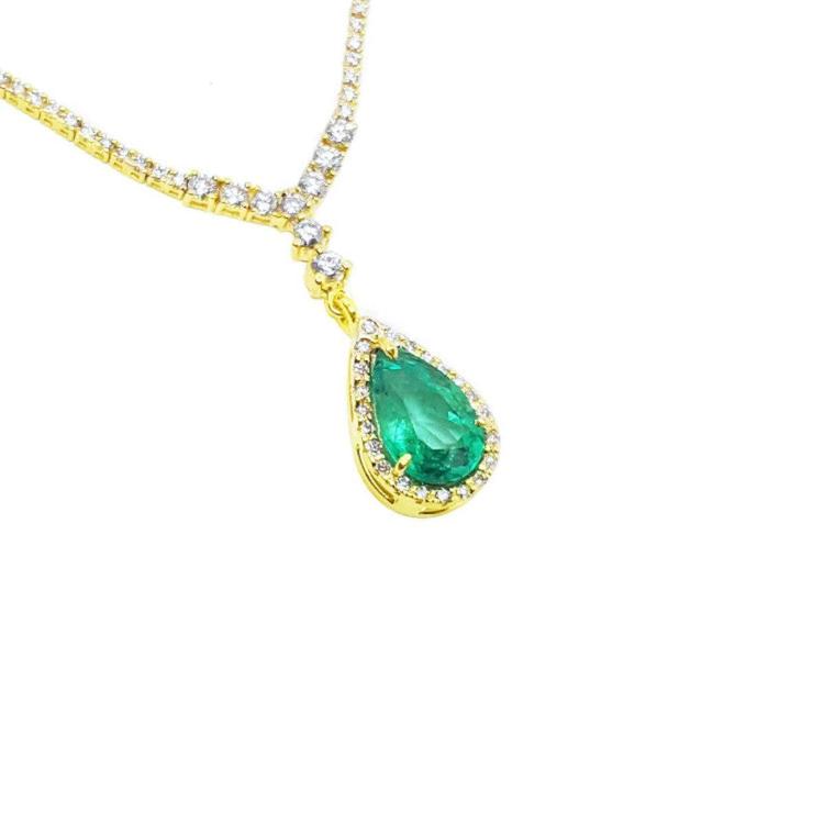 right side of pear cut natural Muzo mine emerald necklace real Colombian emerald crafted in 18k yellow gold