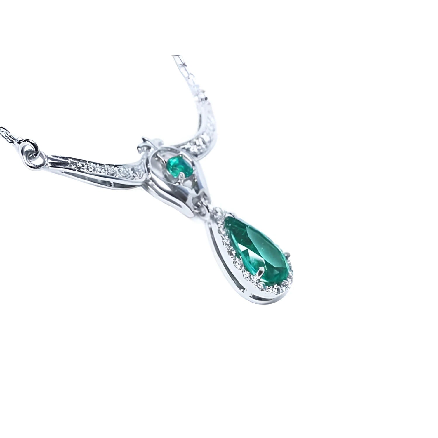 14K white gold necklace with a pear-shaped emerald pendant surrounded by diamonds.