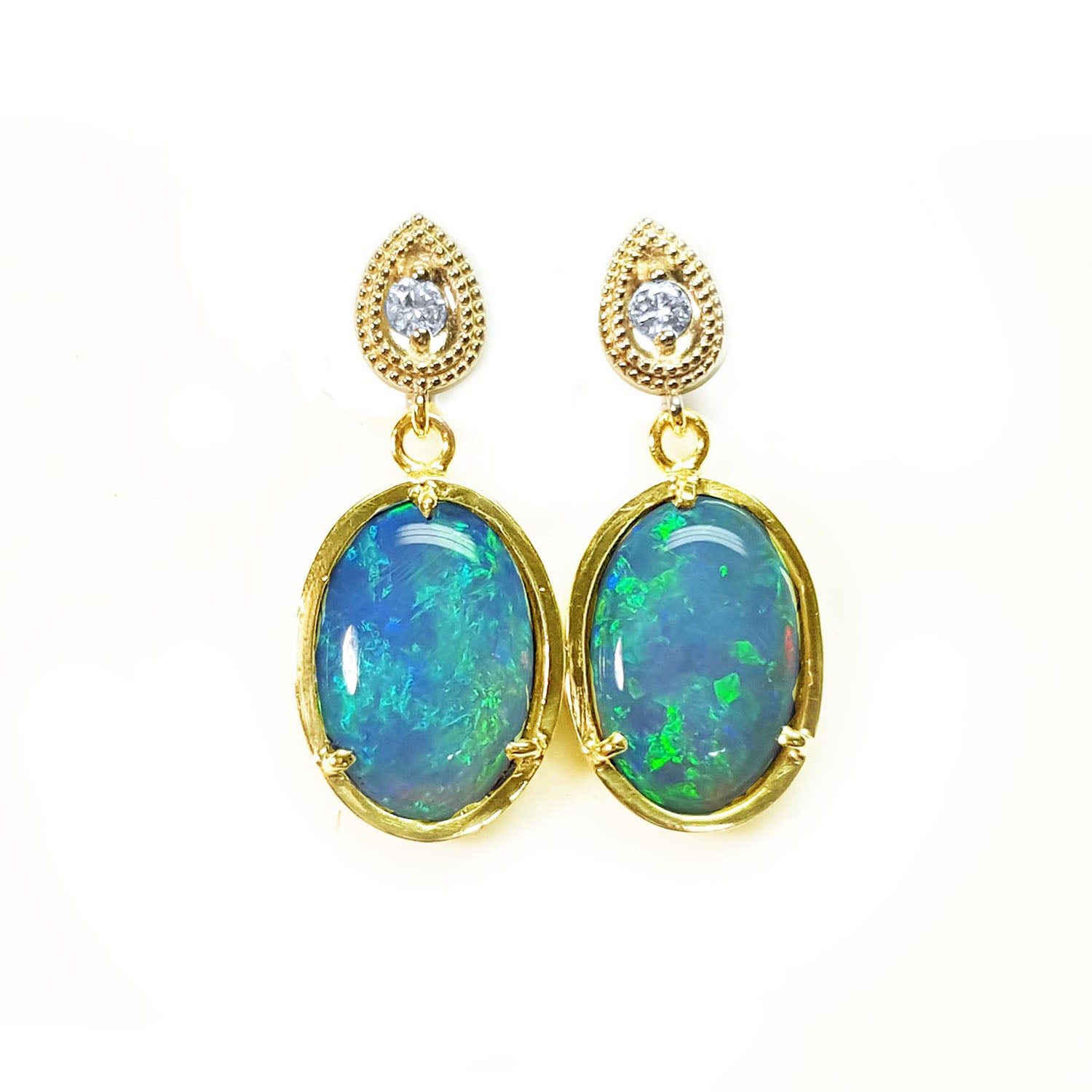 Australian opal earrings with gold setting on a topside view position.