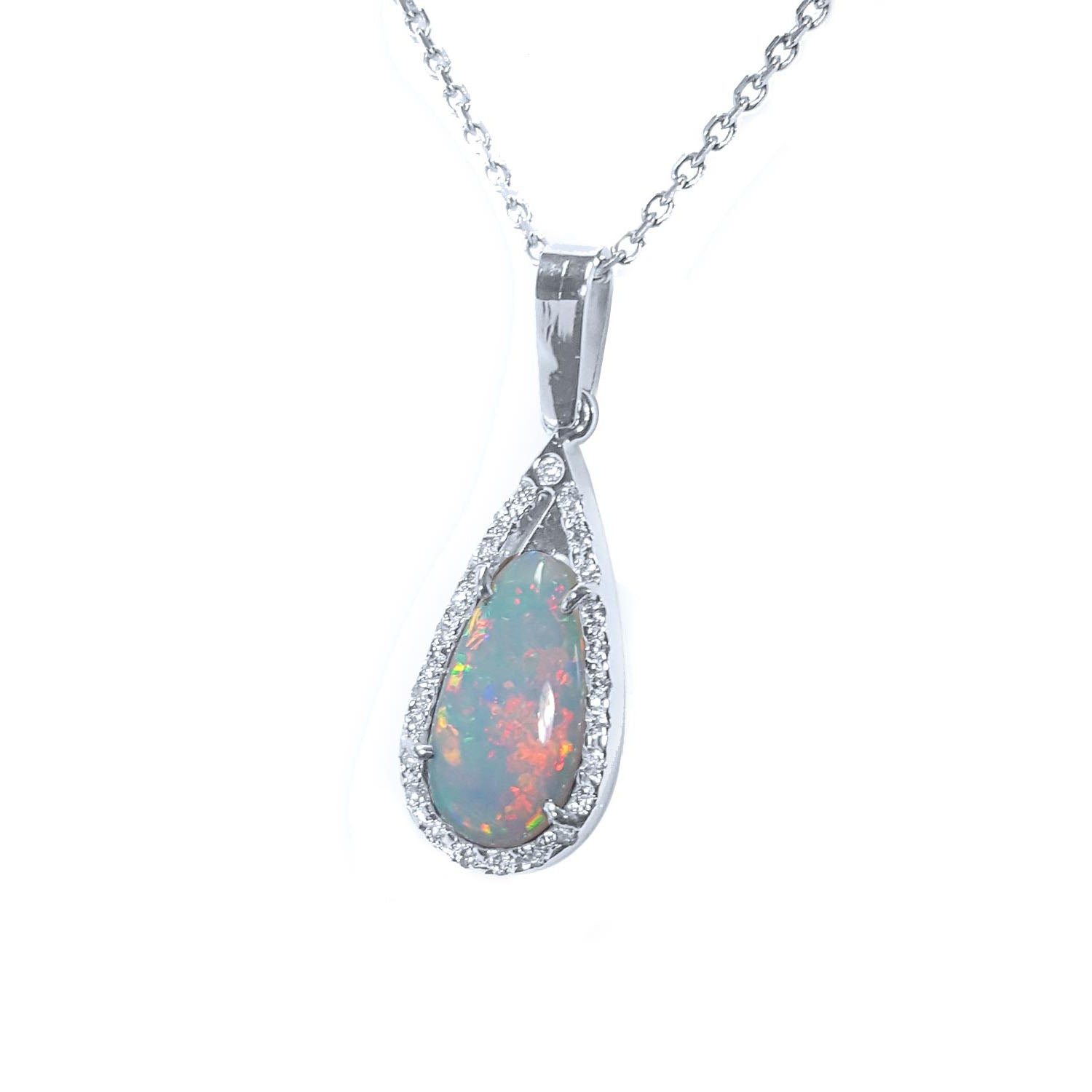 Teardrop-shaped opal pendant on a white gold chain shows the left-side profile.