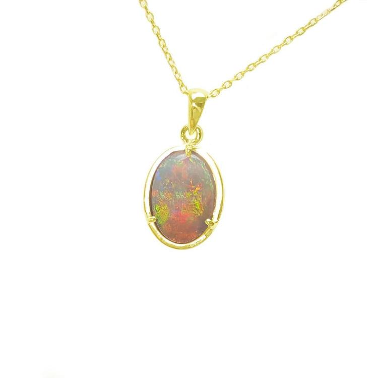 Opal pendant necklace on a gold chain against a white background