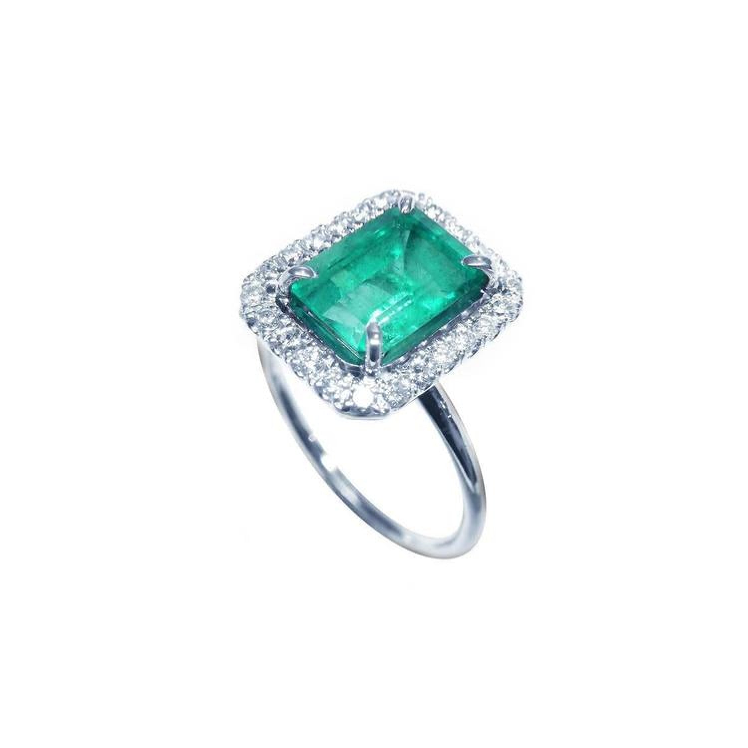 Emerald-cut bluish-green emerald ring with halo diamonds in 14K white gold.