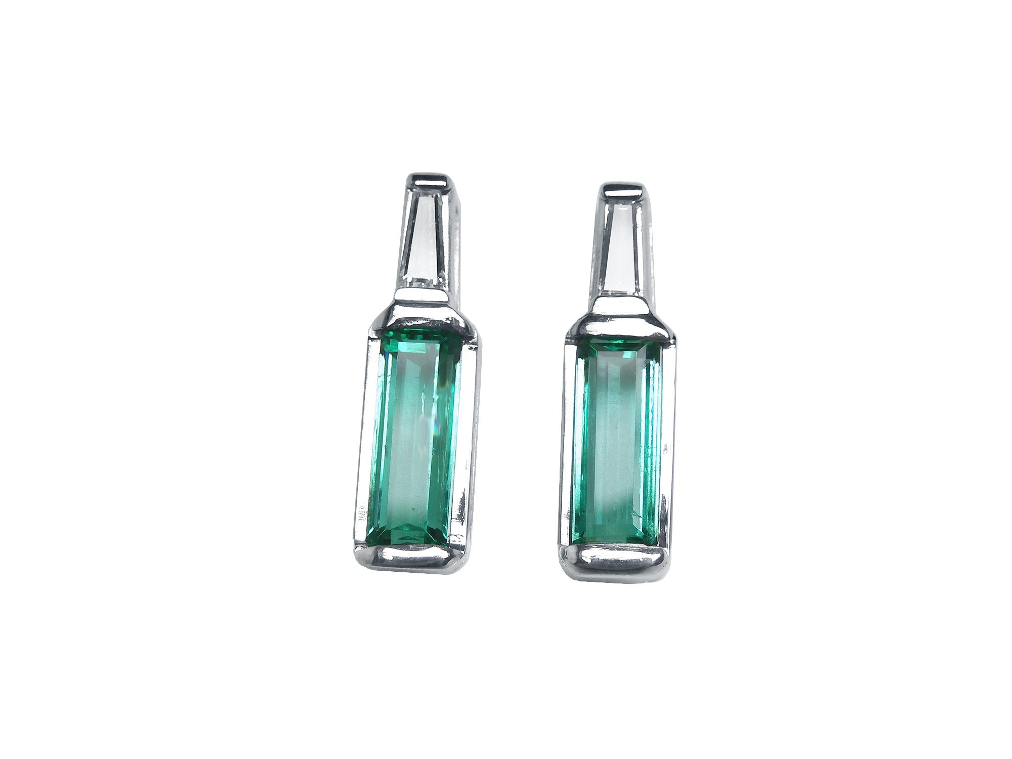 Two Greenfire 14k white gold baguette cut emerald stud earrings, front position top view.