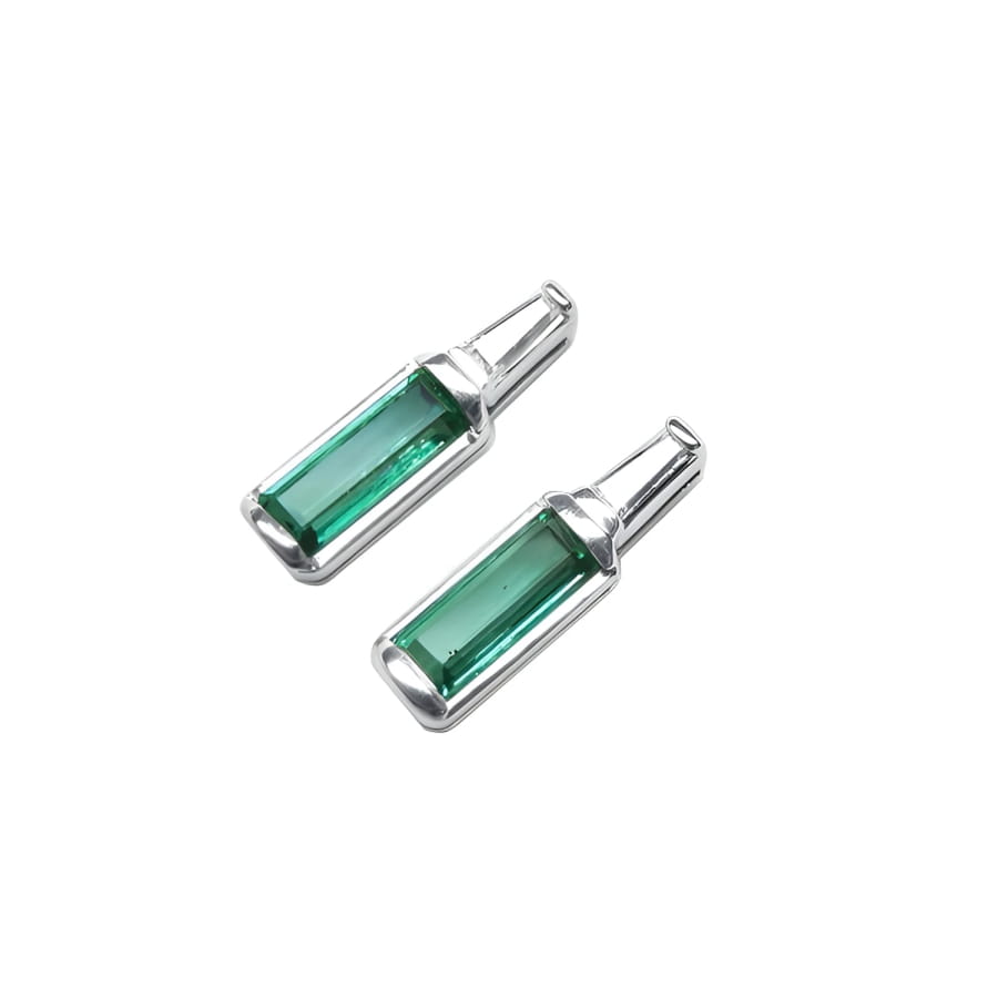 2.00 ct. natural baguette emerald stud earrings in 14k white gold with sparkling medium green emeralds.