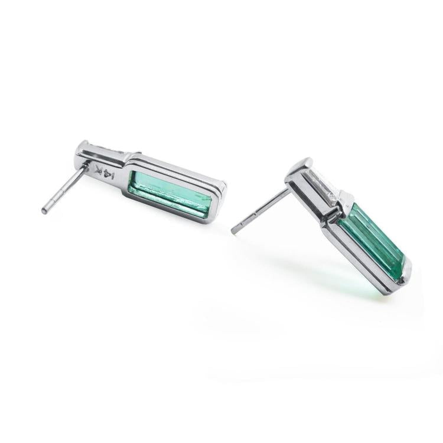 2.00 ct natural baguette emerald stud earrings in 14k white gold with diamond accents and push backs.