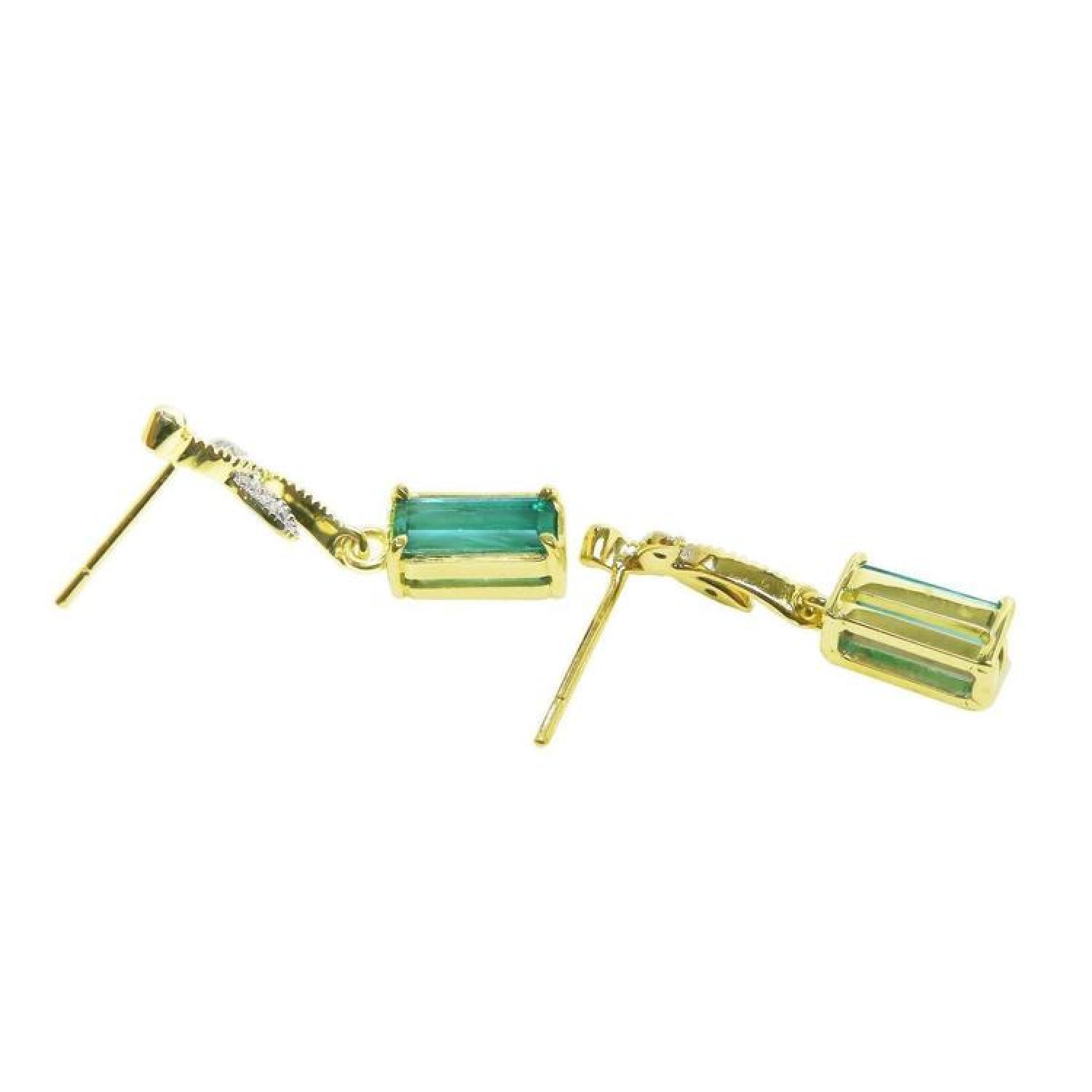 14K gold stud emerald leaf earrings with rectangular green emeralds and diamonds.