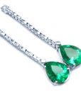 Pear emeralds and diamond earrings