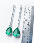 May birthstone emerald dangle earrings