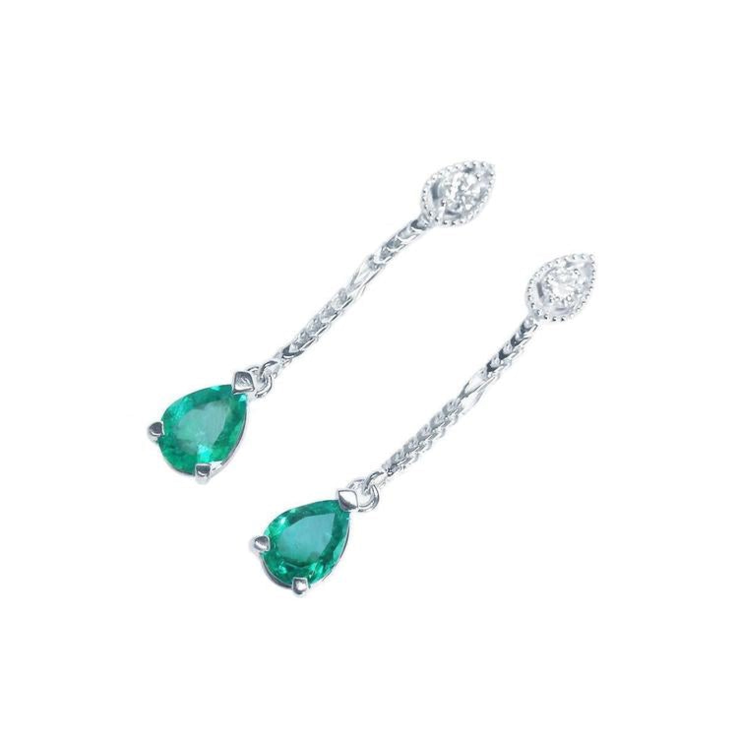 Pear-shaped Muzo Colombian emerald dangle earrings in 14K white gold with diamond accents.