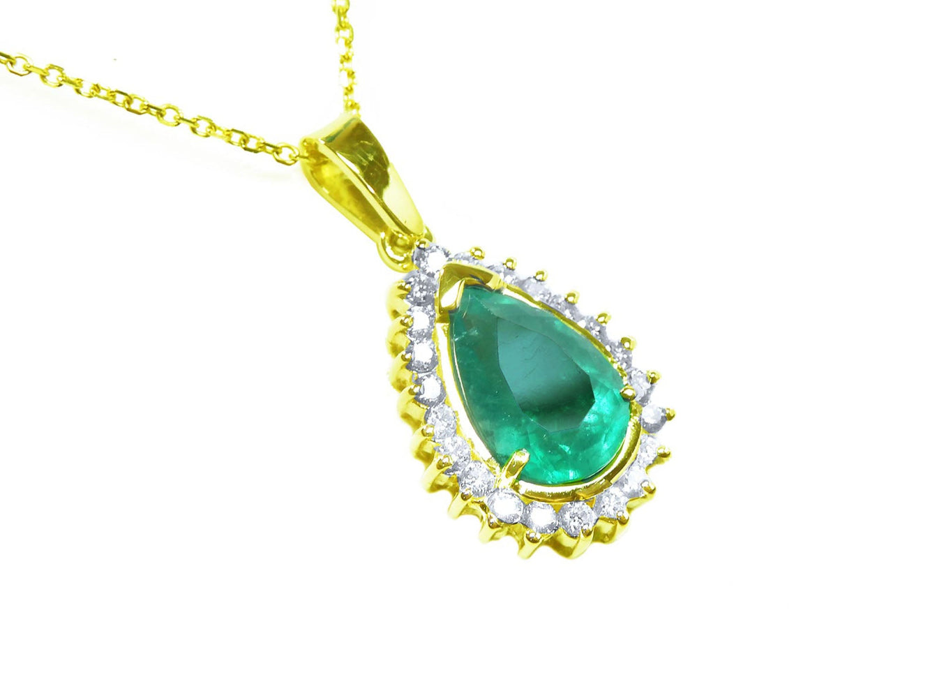 Gold pendant with a teardrop-shaped natural emerald surrounded by a halo of genuine diamonds